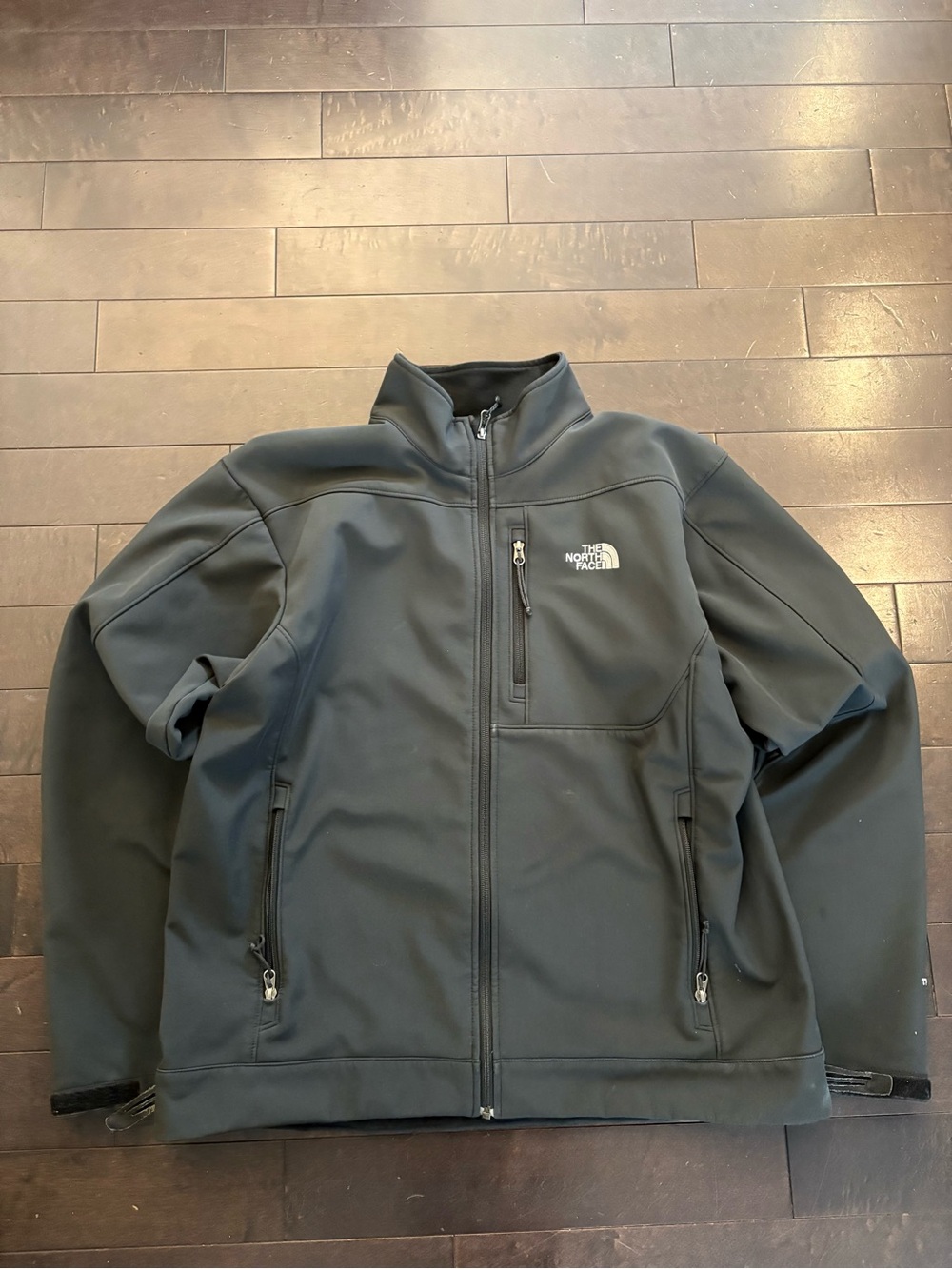 The North Face Men's Black Softshell Jacket with Zippered Chest Pocket